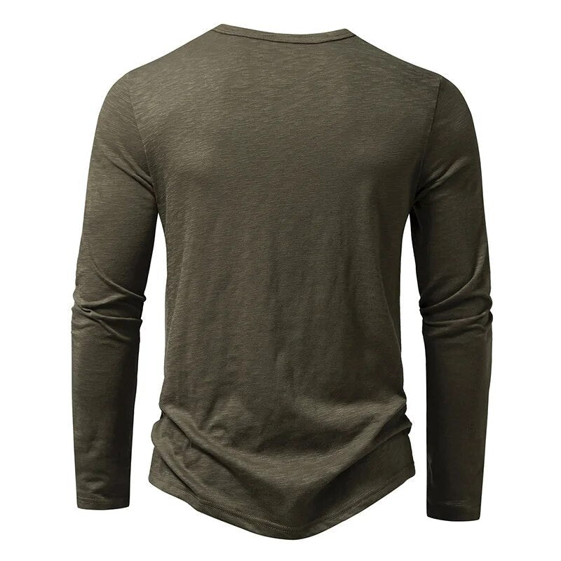 Navy blue men's slim fit henley. Classic long sleeve shirt for versatile everyday style.