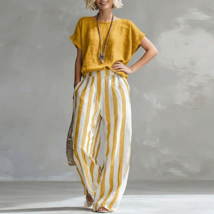 Women's relaxed linen summer set with wide-leg pants. Breathable two-piece outfit perfect for casual wear.