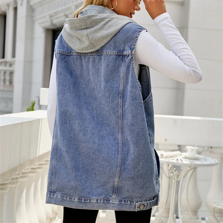 Black hooded denim vest for women. A stylish sleeveless layering piece, ideal for casual wear & outfits.