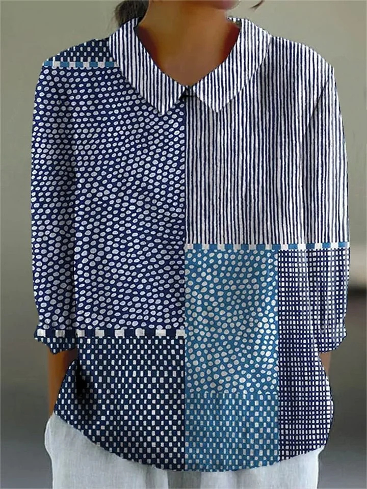 Women's blue patchwork print collared blouse, long sleeve. Trendy, casual ladies top for spring/summer fashion.