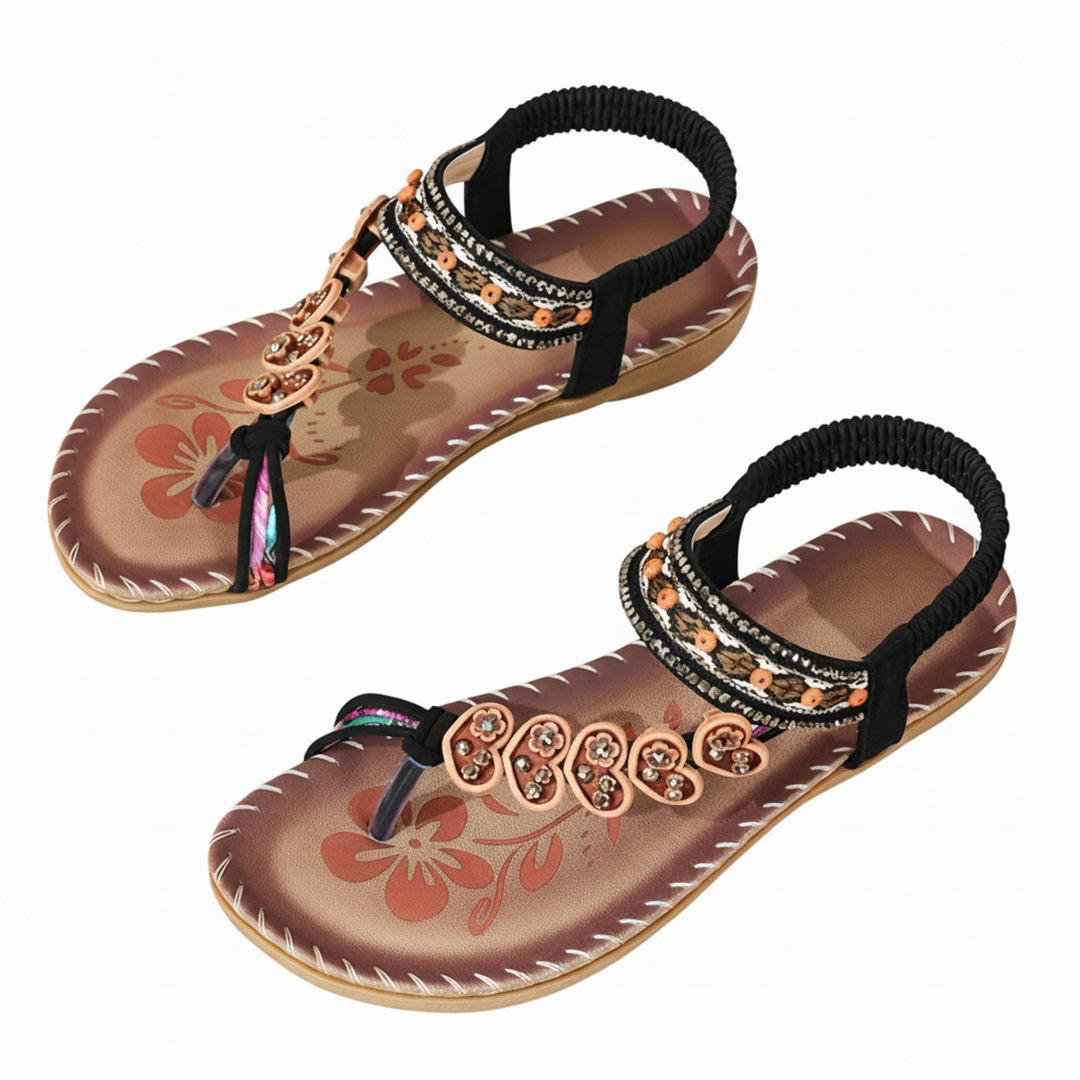 Bohemian chic women's thong sandals, flat design, featuring a lovely floral ankle strap, comfortable.