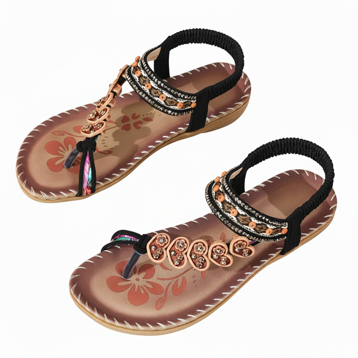 Bohemian chic women's thong sandals, flat design, featuring a lovely floral ankle strap, comfortable.