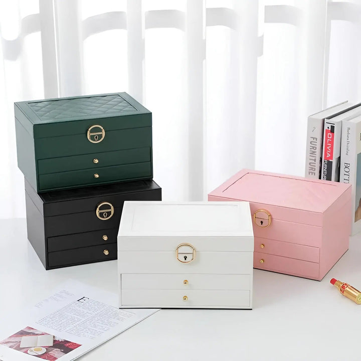 Green multi-tier faux leather jewelry storage box, chic vanity accessory.
