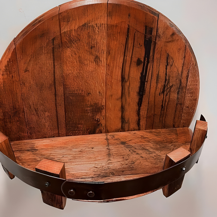 Handcrafted rustic wall shelf made from an authentic whiskey barrel, great for any home bar.