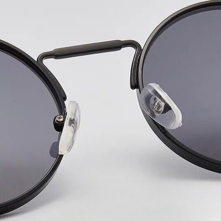 Retro round UV protection sunglasses, unisex design, vintage shades for sunny days.