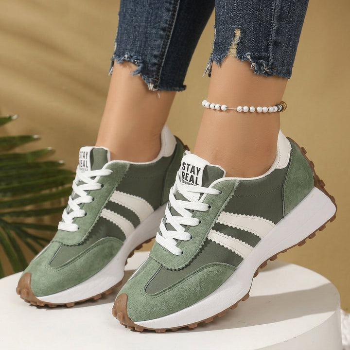 Comfortable women's athletic shoes, lightweight design with excellent orthopedic foot support.