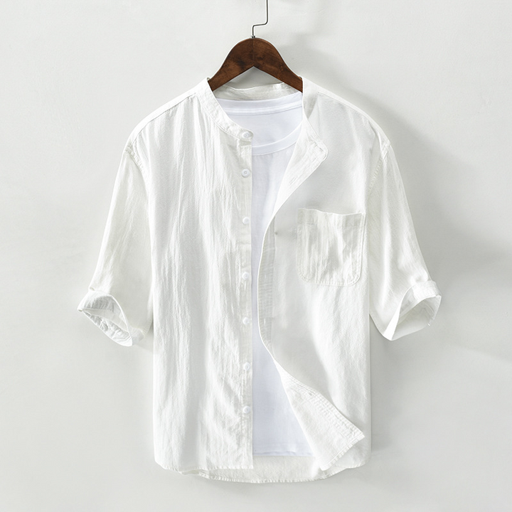 Versatile men's relaxed fit breathable summer shirt, button-up style, great for casual beach & vacation.