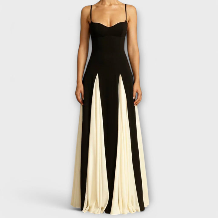 Flowy black maxi sundress for women, ideal for casual summer fashion, vacations, or elegant daily wear.