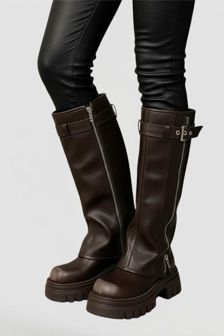 Tall brown platform boots for women, knee-high design adds elegance. Stylish footwear for any fashion-forward look.
