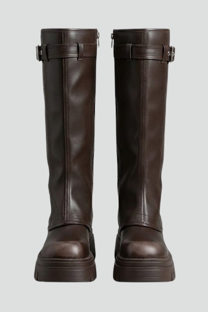 Stylish brown women's knee-high platform boots, perfect for elegant winter fashion. Features a comfortable round toe.