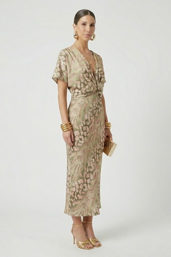 Green floral V-neck midi dress for women, featuring a beautiful pleated hem and short sleeves, elegant style.