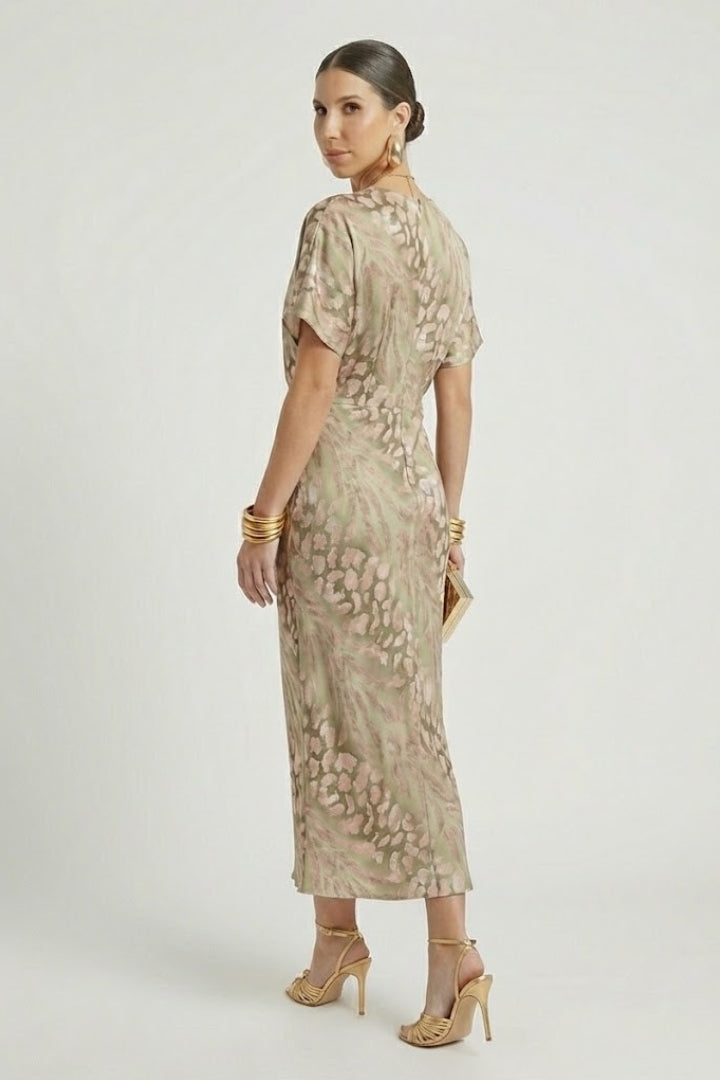 Comfortable women's green floral midi dress, elegant V-neck design with pleated hem, great for garden parties.