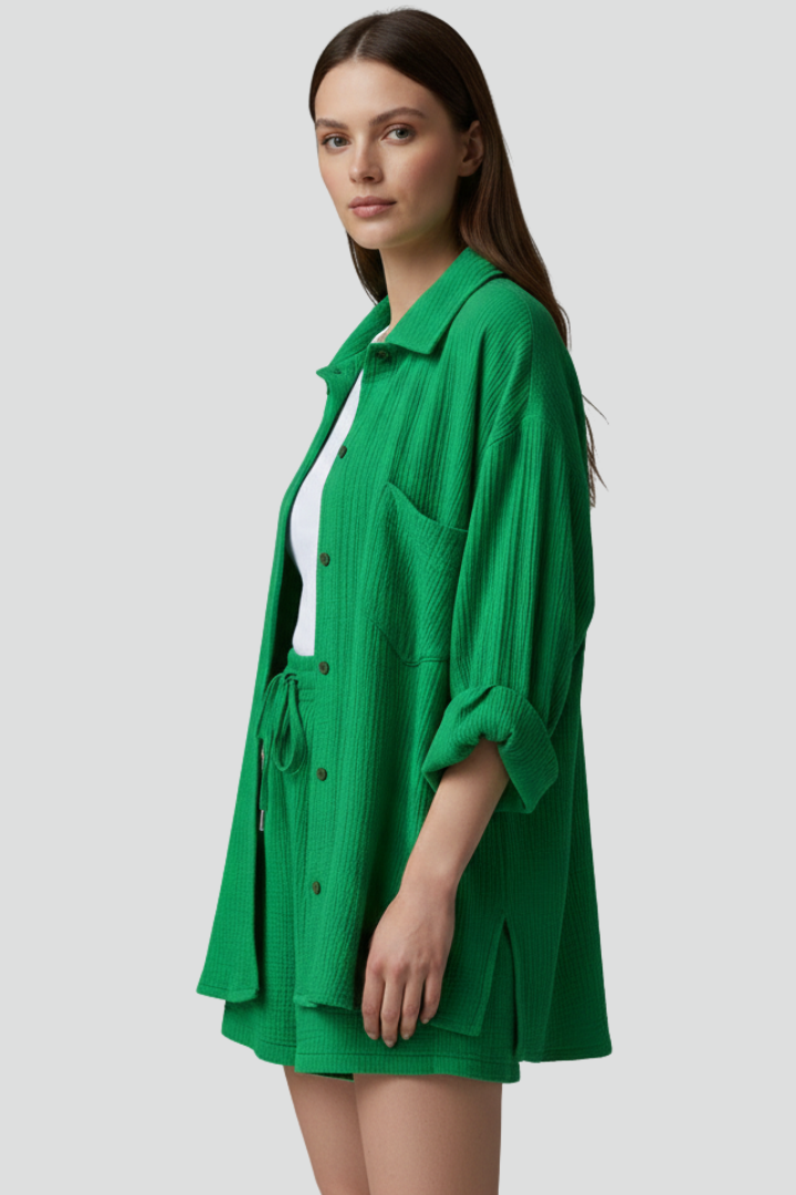 Stylish green women's relaxed lounge set, featuring a long sleeve shirt and comfortable matching shorts.
