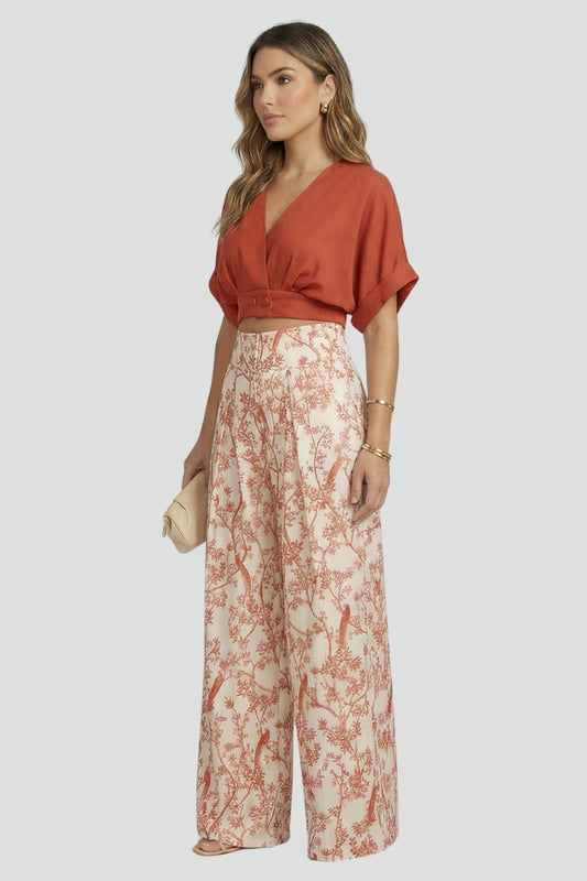 Fashionable women's V-neck two-piece set with wide leg trousers for a trendy summer style.