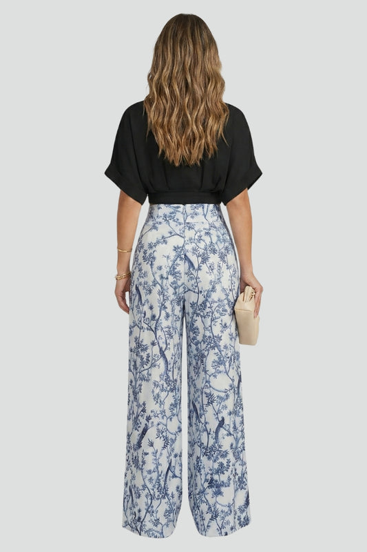 Trendy women's two-piece outfit featuring a V-neck top & versatile wide leg pants.