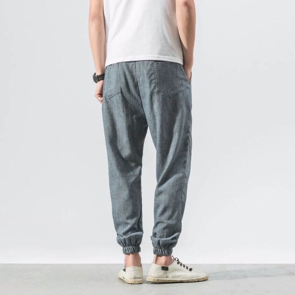 Relaxed fit men's summer pants, breathable fabric, easygoing style.