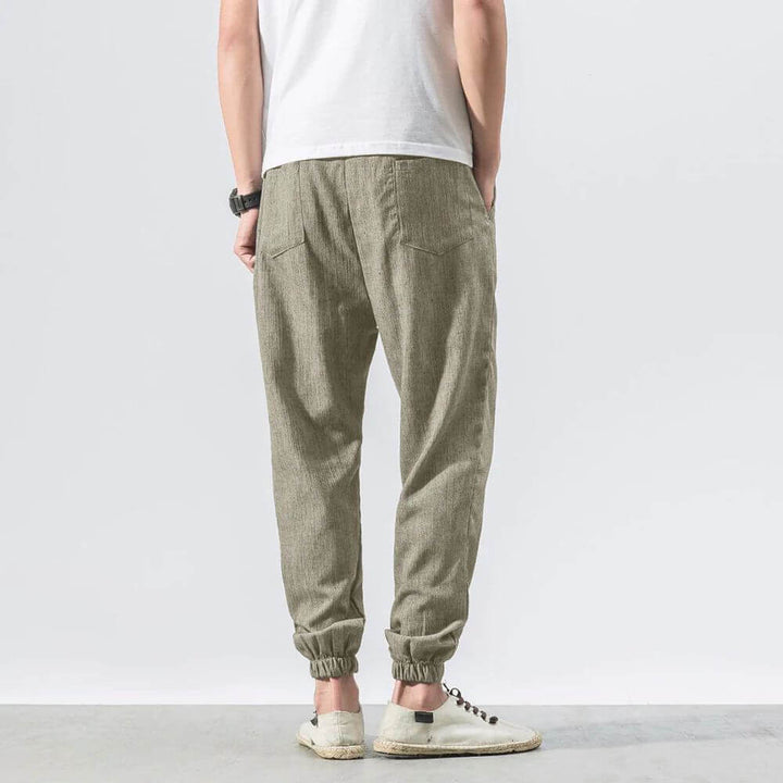 Summer wear men's drawstring pants, breathable & relaxed for comfort.