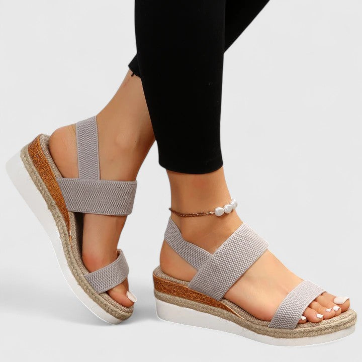 Stylish women's arch support sandals, comfortable wedge design, perfect for summer walks.