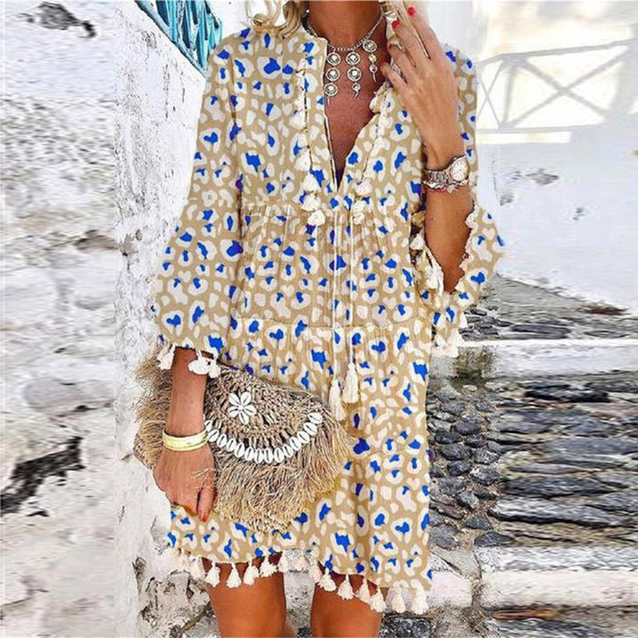 Bohemian V-neck mini sundress for women, featuring elegant bell sleeves and a flowing casual summer style.