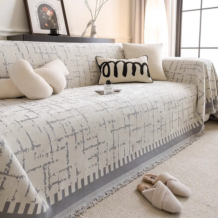 Beige chenille couch cover, breathable and anti-scratch, perfect furniture protector for pets and all season use.