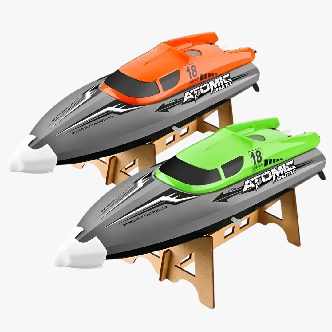 "AquaX RC Rennboot, orange-grün, mit Wasserkühlung und präziser Fernsteuerung, ideal für Wasserrennen, robuste Bauweise."