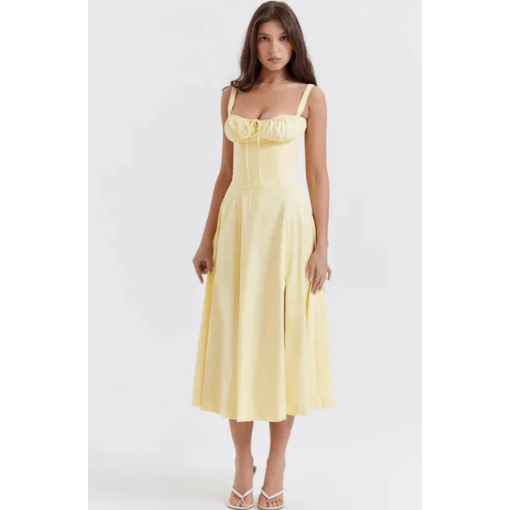 Ärmelloses Sommerkleid mit Sweetheart-Ausschnitt, eleganter Midi-Schnitt, tailliertes Design für feminine Silhouette.