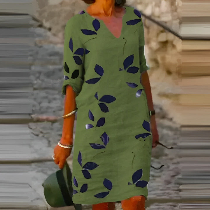 "Atemberaubendes Damen-Sommerkleid mit Blätterdruck, elegant und leicht, perfekt für stilvolle Sommeranlässe."