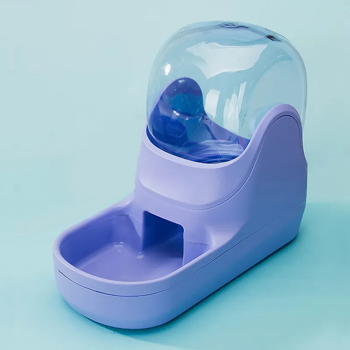 Combined automatic pet feeder and water dispenser in green, top view showing dual functionality