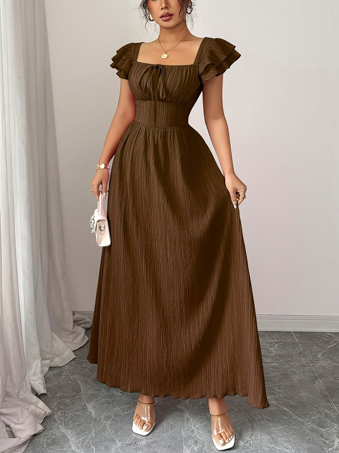 Women's dark brown A-line maxi dress with an elegant square neck and smocked bodice, perfect for summer.