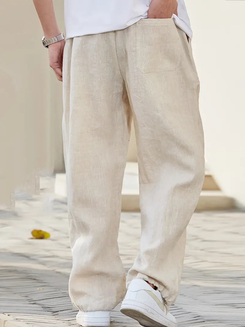 Baggy Leinenhose Herren, lässiger Schnitt, atmungsaktives Material, trendiger Look, beige Farbton, vielseitig kombinierbar.