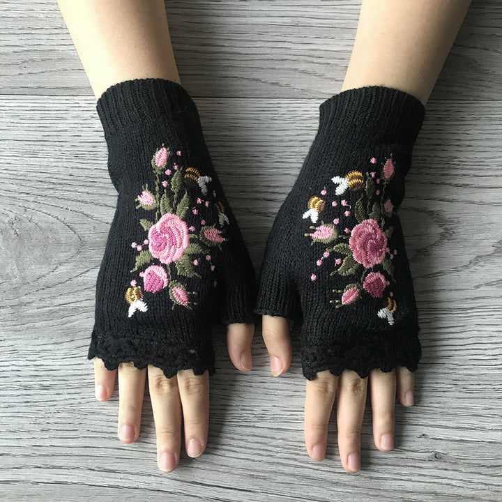 Stylish women's fingerless gloves, featuring intricate floral embroidery. Ideal knit hand warmers for winter.