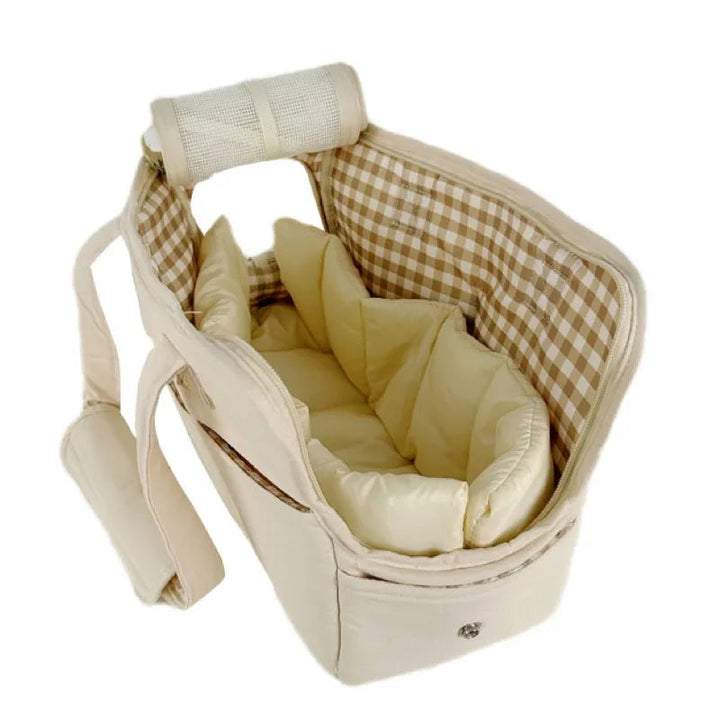 Breathable pet carrier for small pets, beige, featuring secure zipper closure.