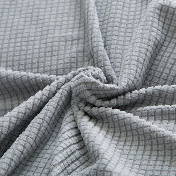 Beige Sofahusse aus elastischem Stretchmaterial, perfekter Sitz, Schutz vor Flecken, Schmutz und Tierhaaren.