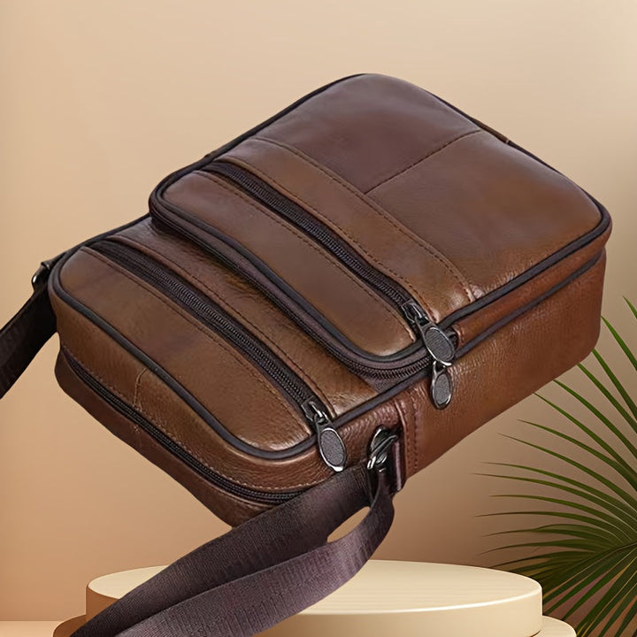 Stylish black men's shoulder bag with adjustable strap, perfect for everyday carry & travel.