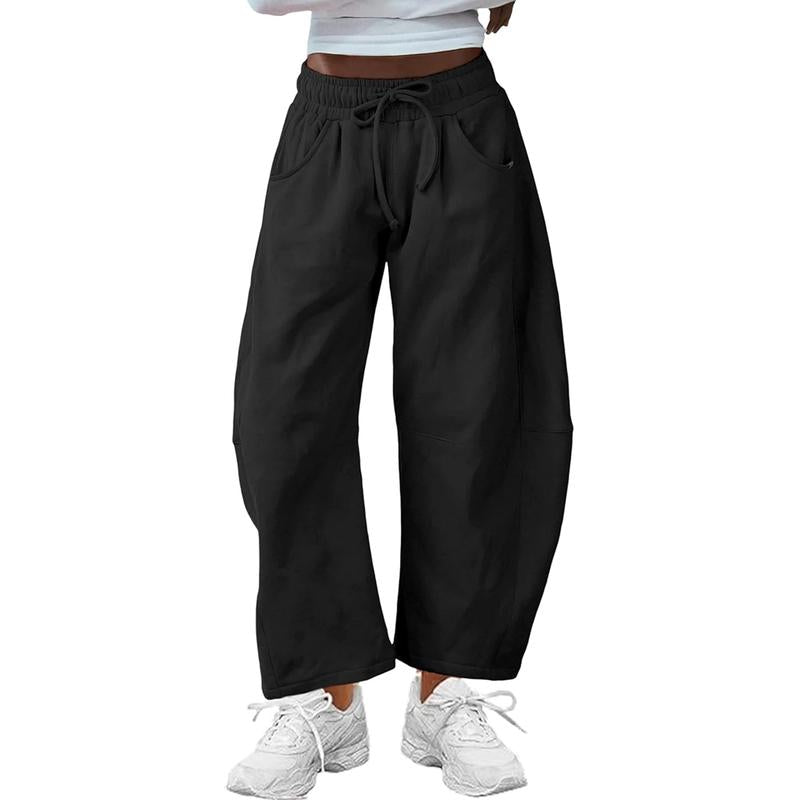 Elegant women's barrel-leg pants in a relaxed fit, perfect for chic, modern everyday wear.