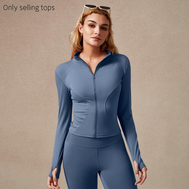 Long sleeve zip top for women, sculpted activewear with thumbholes for training.