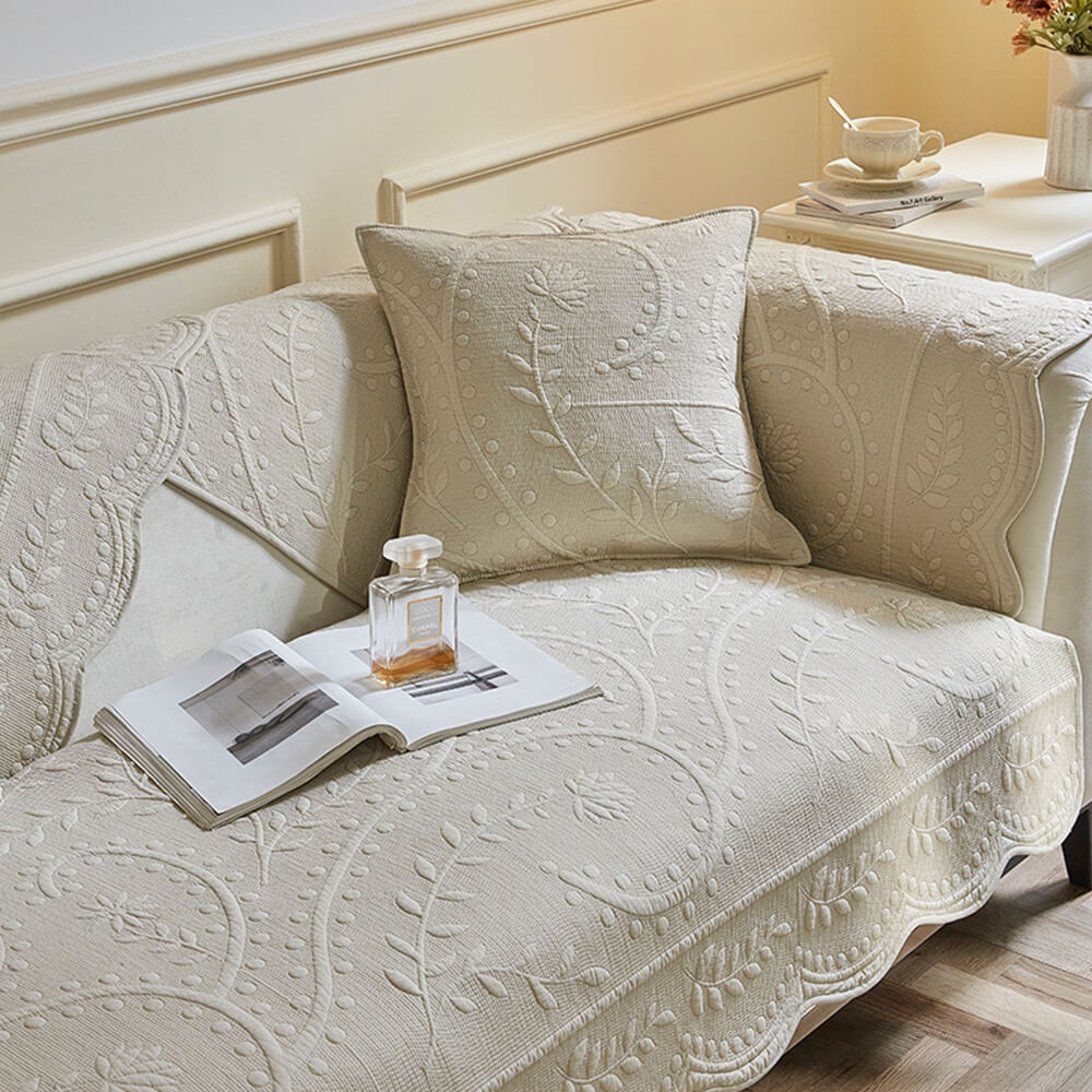 Soft cotton sofa slipcover with a bohemian textured pattern, a stylish and washable home decor solution.