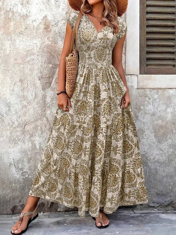 Women's boho V-neck maxi dress, offering effortless style & comfort. Perfect for summer & resort wear.