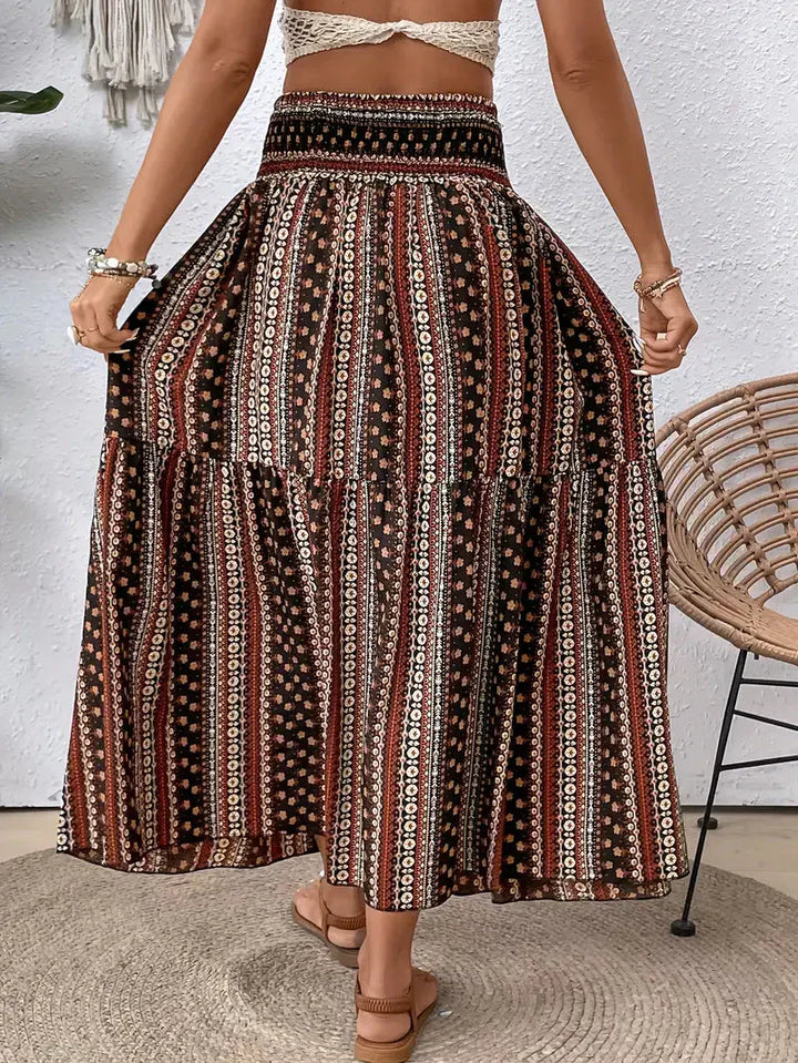 Boho Maxirock Damen, fließend mit Muster und raffinierter Taille, für elegante Looks in Schwarz, Rot oder Braun.