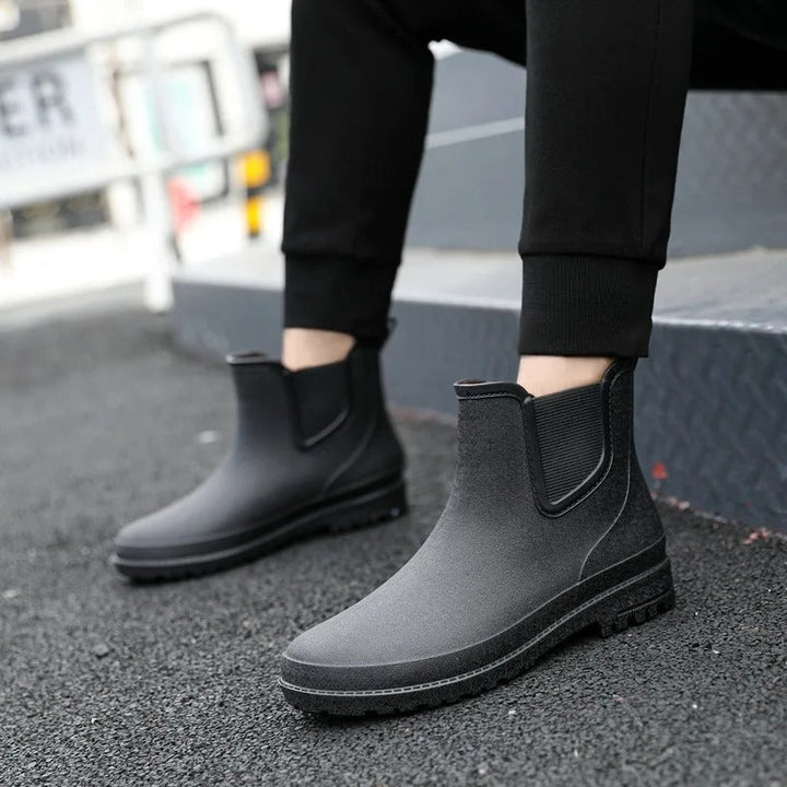 Wet weather women's waterproof Chelsea platform ankle boots. Fashionable slip-on rain boots.