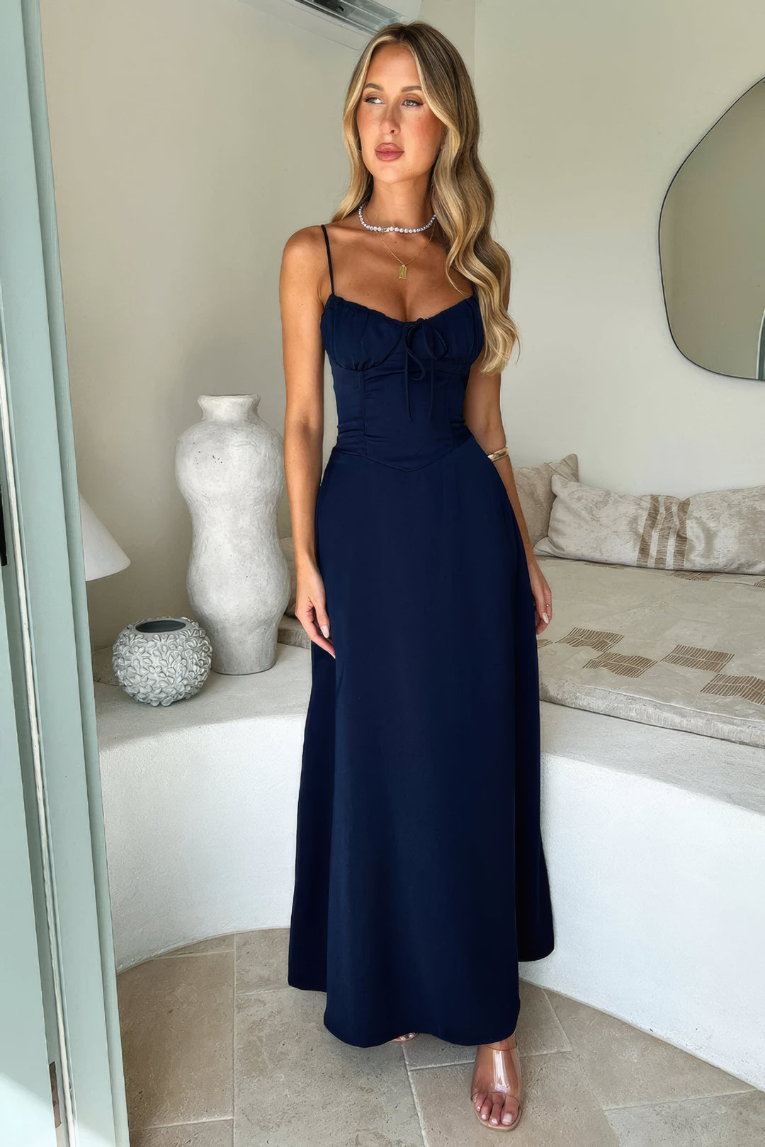 Comfortable A-line maxi dress for women, sleeveless with an elegant tie-front. Ideal for casual wear.
