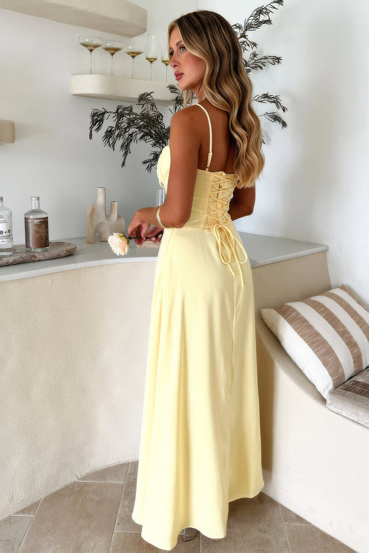 Elegant tie-front sleeveless A-line maxi dress for women. Perfect summer casual or party outfit.