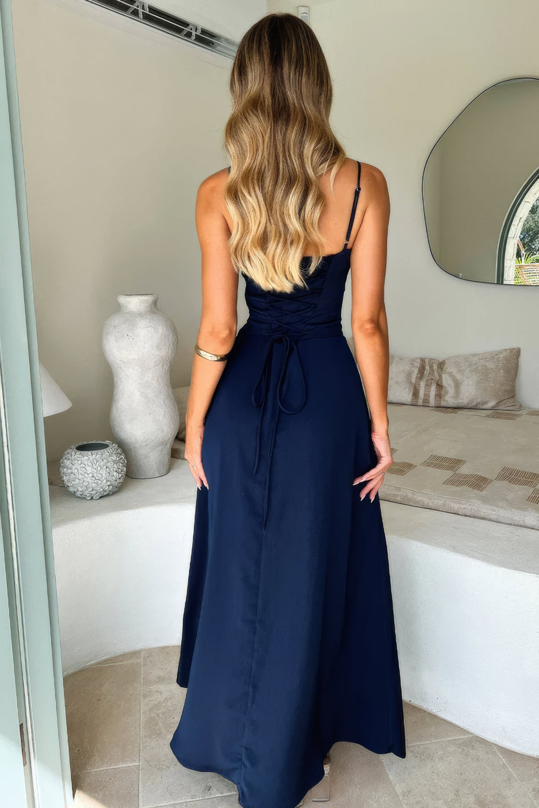 Effortless elegance in this women's sleeveless A-line maxi dress with a sophisticated tie-front.