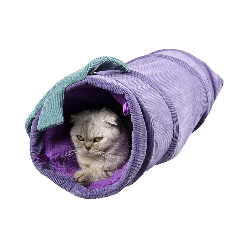 Pet supplies: flower-themed cat tunnel, an engaging interactive toy and cozy lounger for cats.