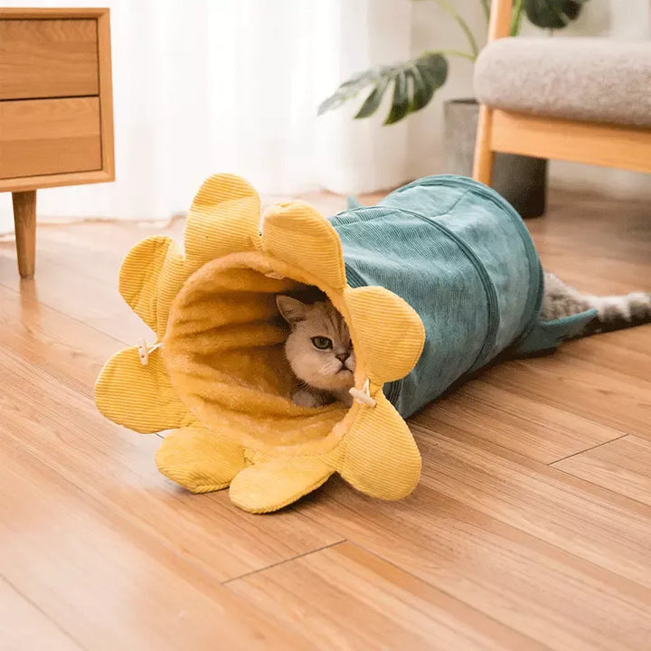 Feline play tunnel and lounger, featuring a bright flower design, ideal for energetic cats.