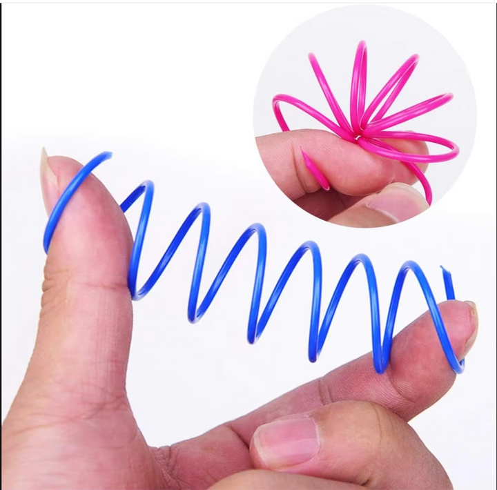 Close-up of a vibrant spiral feather cat toy, perfect for interactive play and pet enrichment