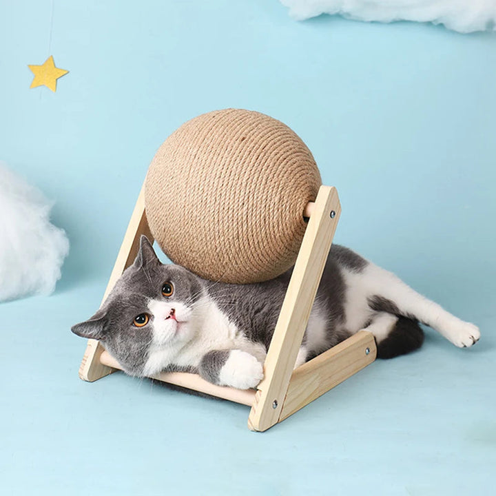 Cat scratcher with sisal rope and an engaging solid wood toy, promoting healthy scratching.