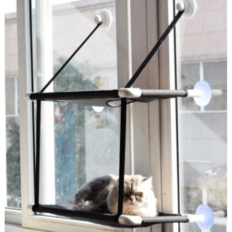 Modern cat furniture: a window-mounted pet perch with suction cups, designed for ultimate cat comfort and view.