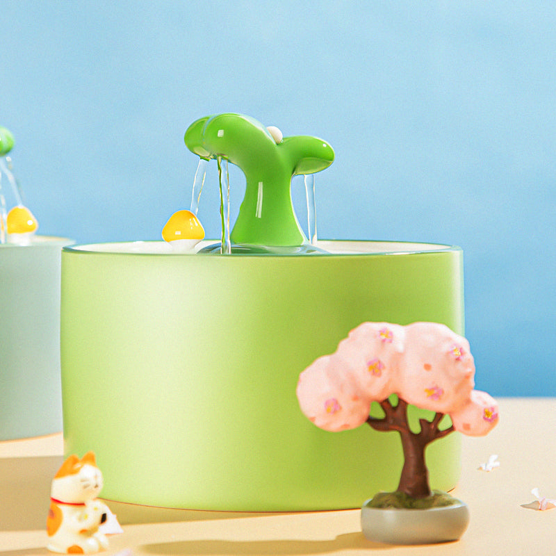 Ceramic pet water fountain with double filtration system, promoting pet hydration and clean water.