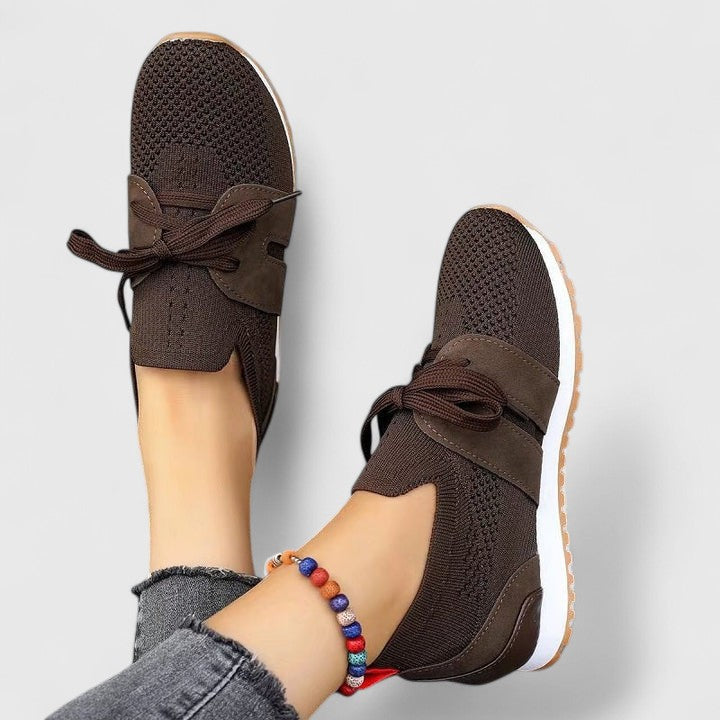Comfortable women's orthopedic slip-on walking shoes, breathable with arch support for daily activity.